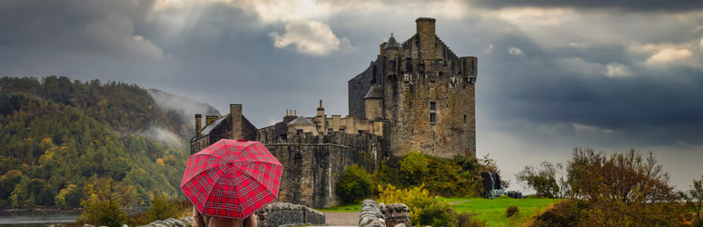 Tourist with red umbrella