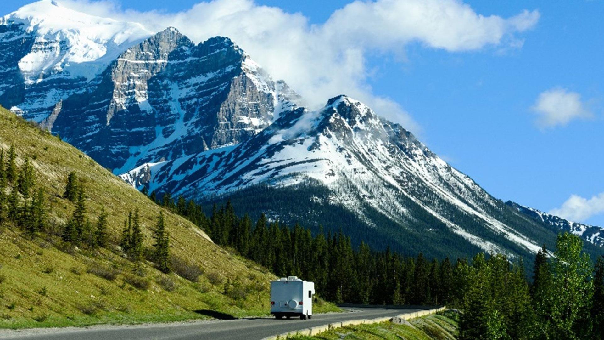 Campervan driving through mountains