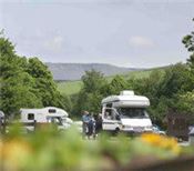 A motorhome arriving on site