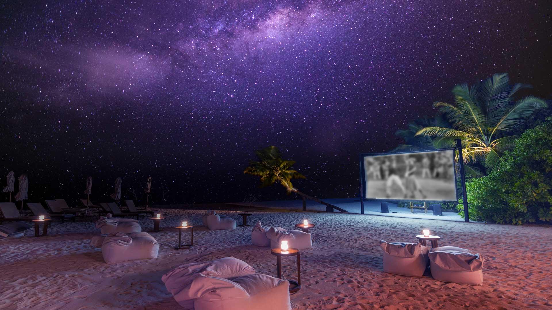 An outdoor cinema by the beach