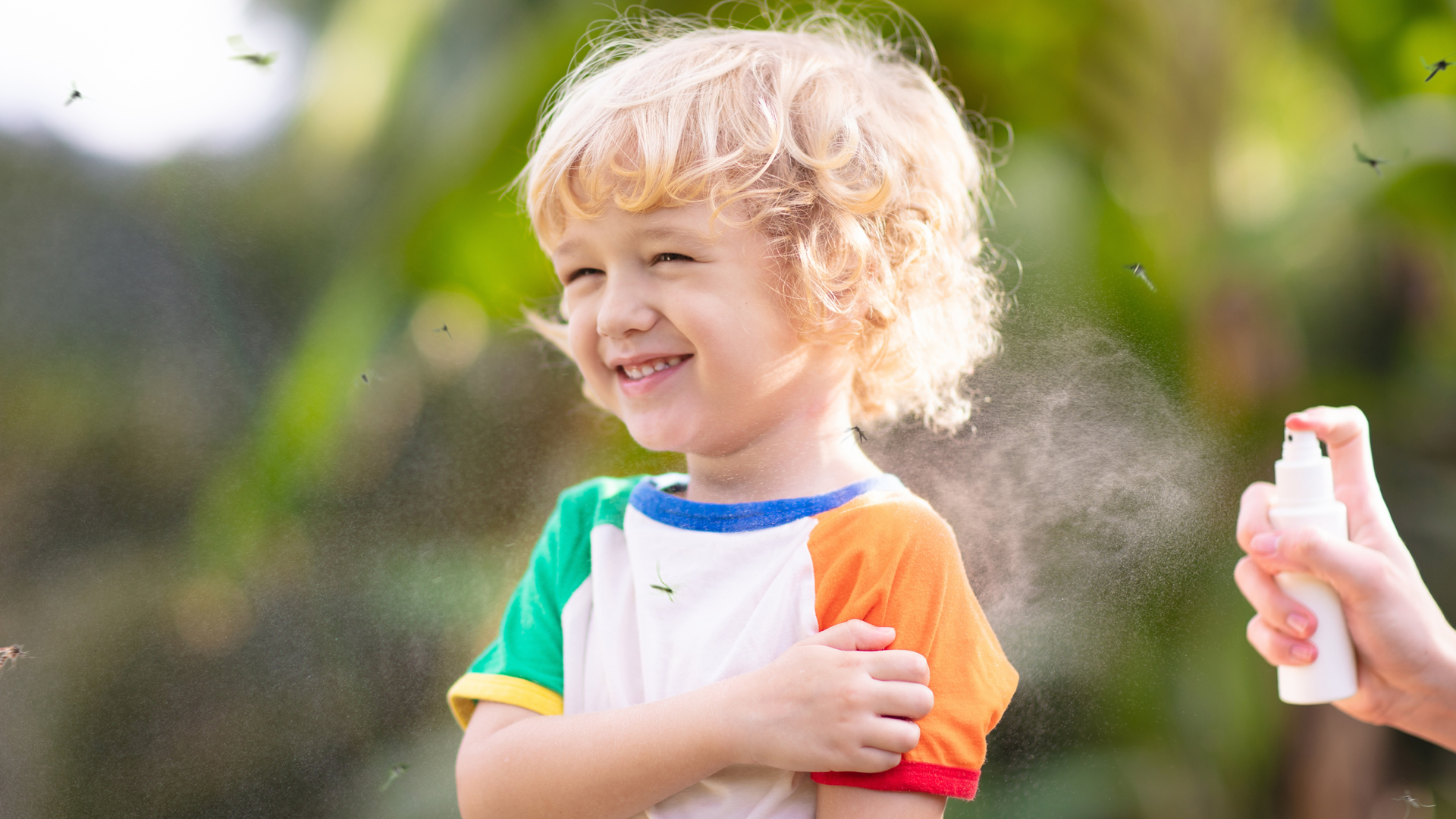 child wearing bug spray